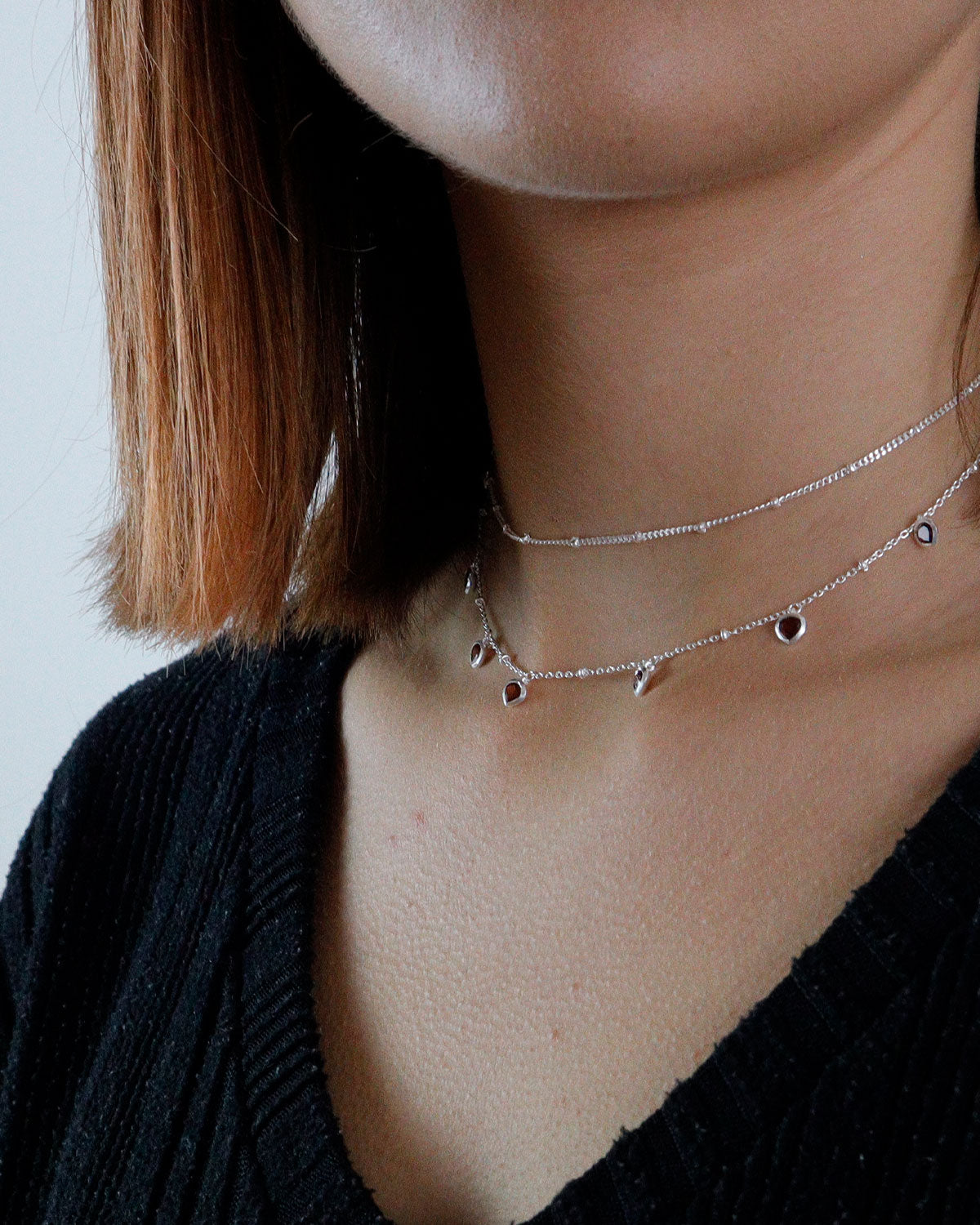 Sterling silver garnet heart necklace inspired by the January birthstone