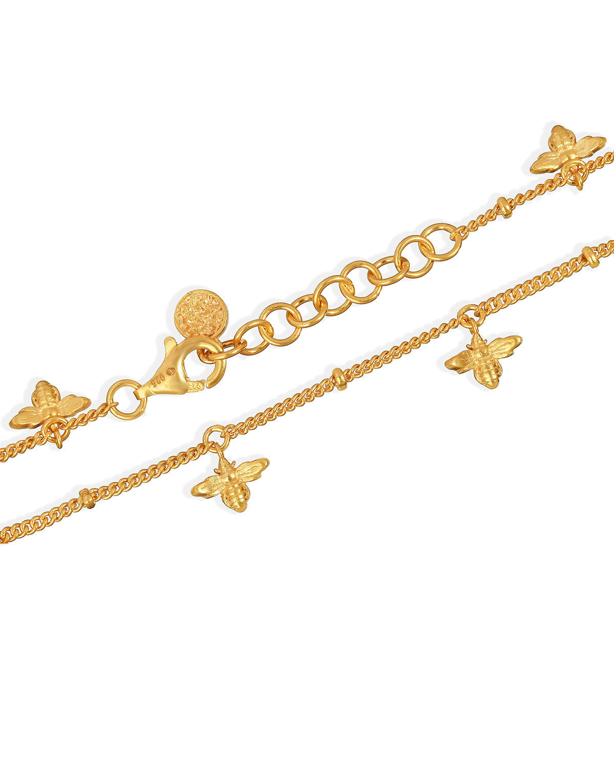 Detailed view of a gold adjustable bracelet with multiple bee motifs