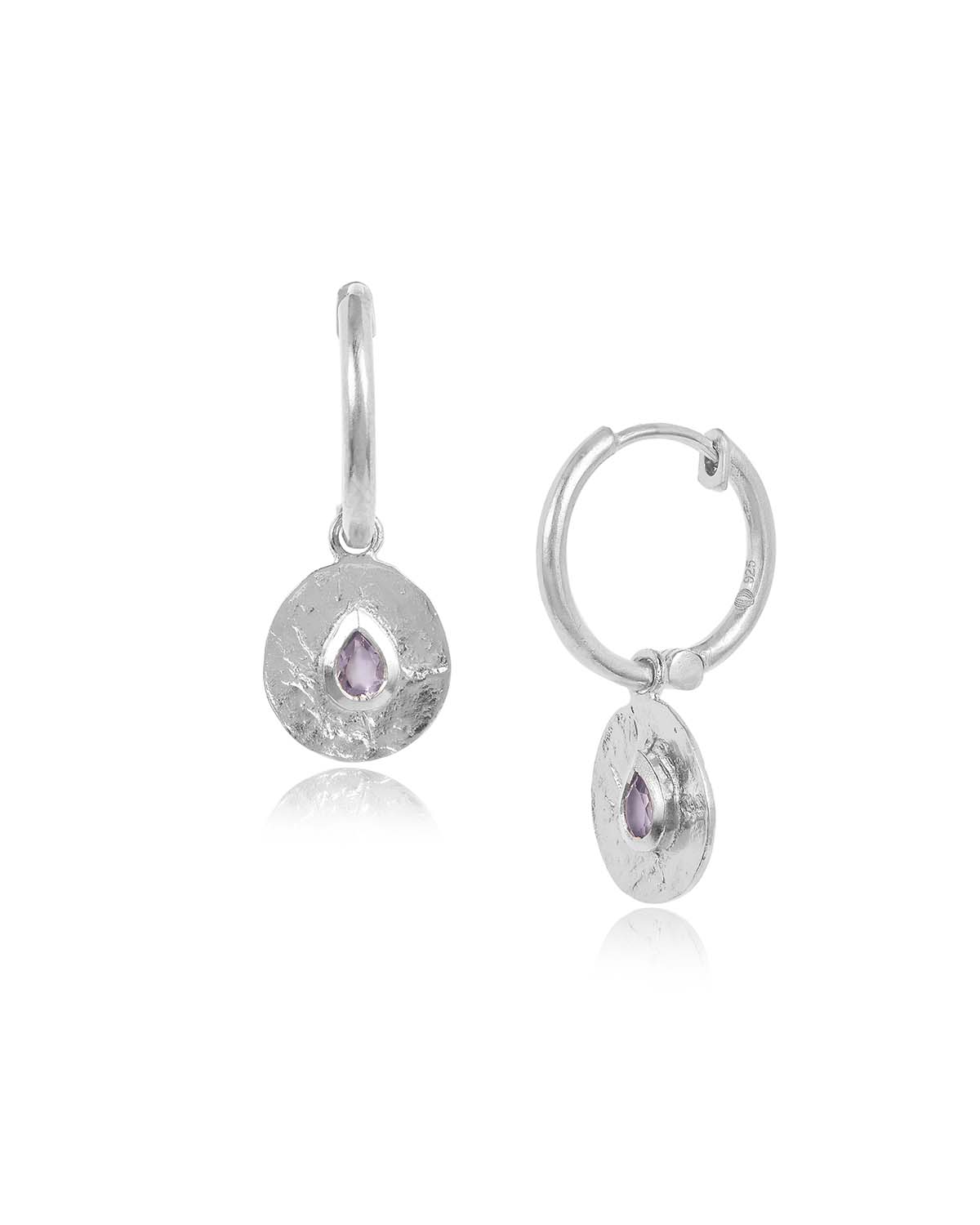 Silver earrings with pink gemstones, front and side view