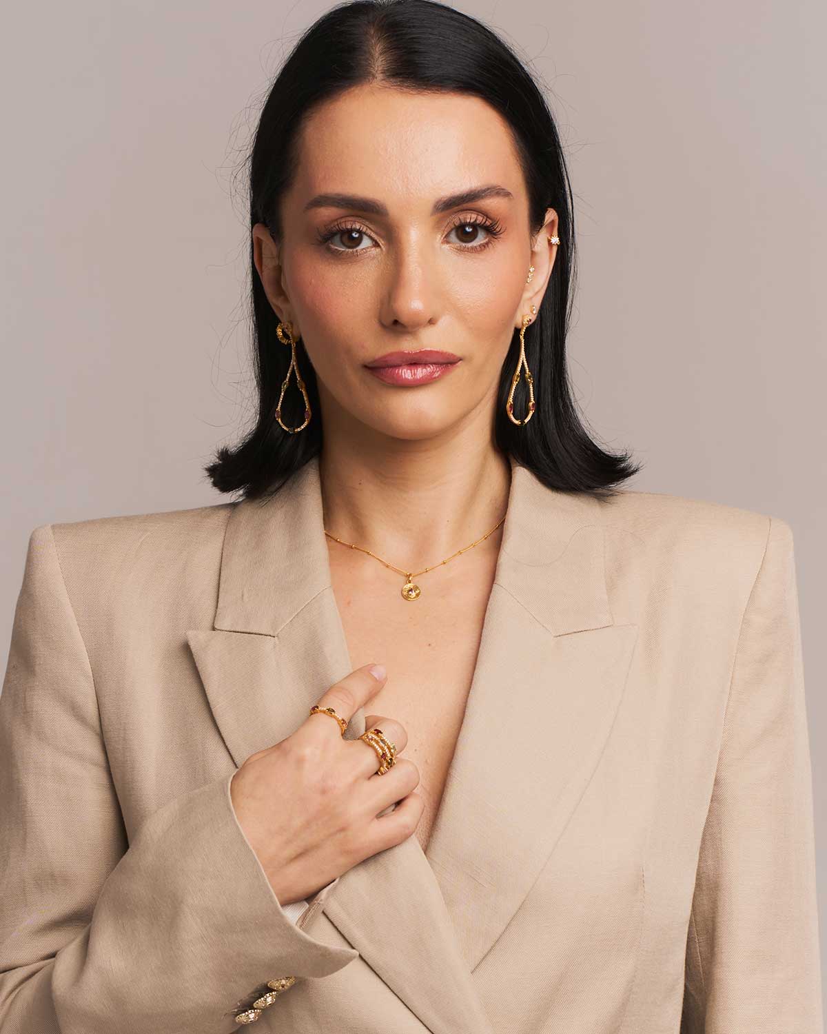 Model wearing a silver adjustable necklace with pink amethyst pendant