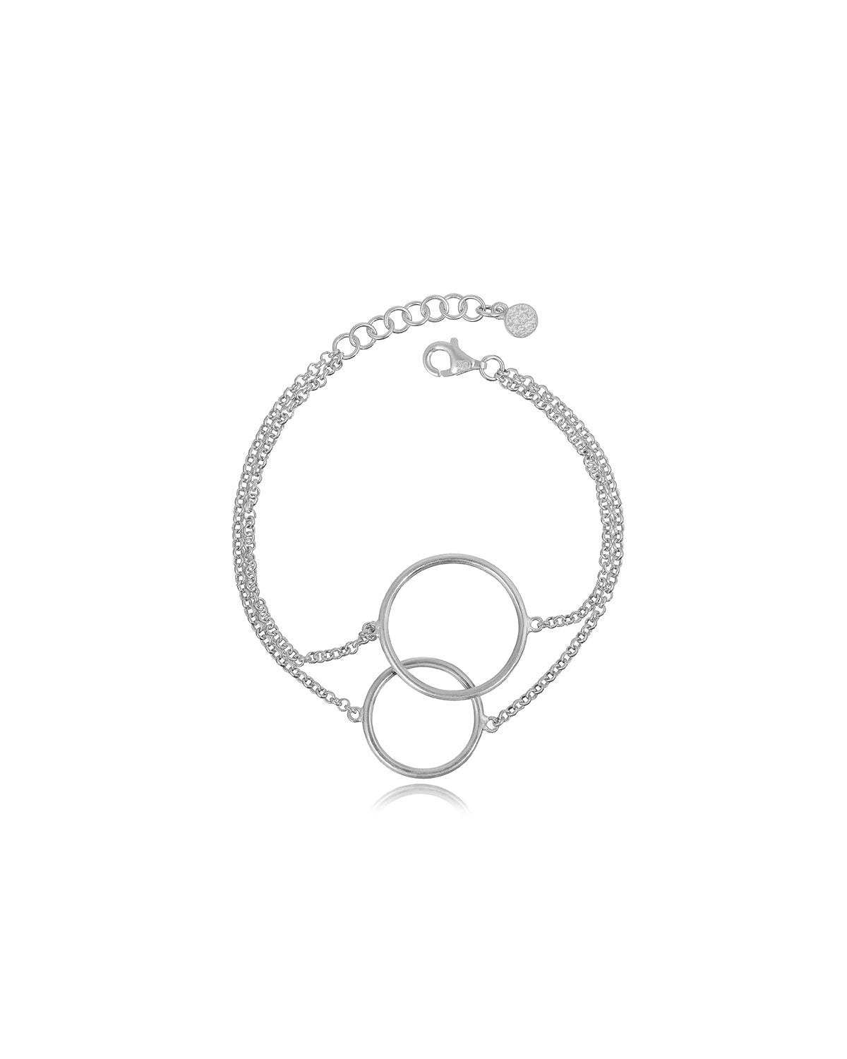 A sterling silver adjustable bracelet with two circular charms and an extension chain.