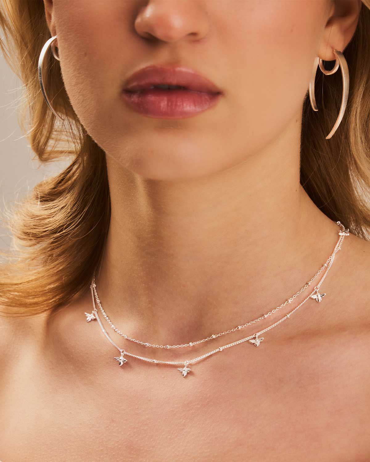 Front view of spiky sterling silver hoop earrings showing the unique spiked detailing