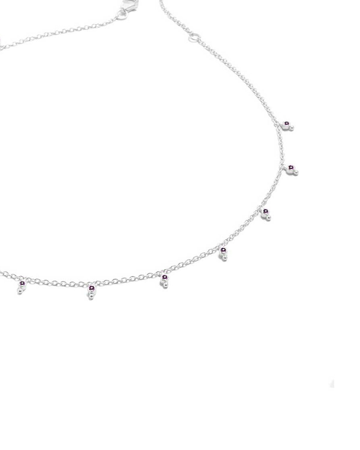 Dainty silver chain necklace with small amethyst gemstones