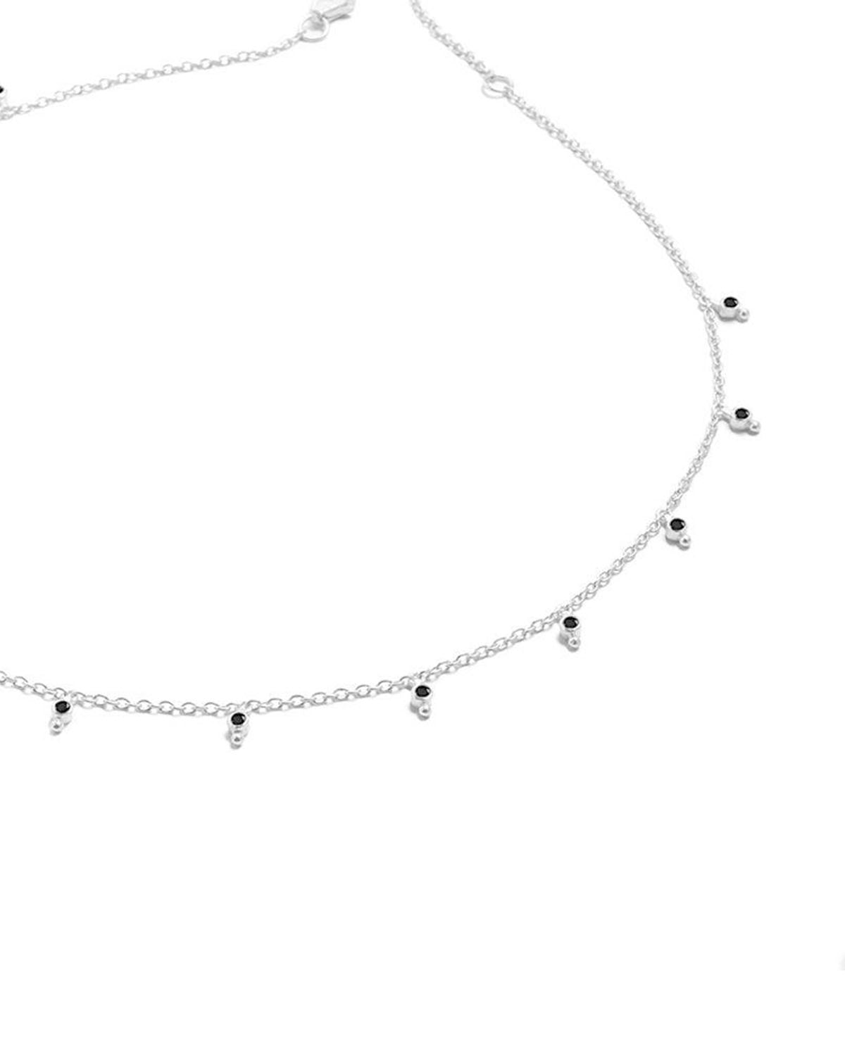 Silver necklace with black spinel gemstones and a light matte finish