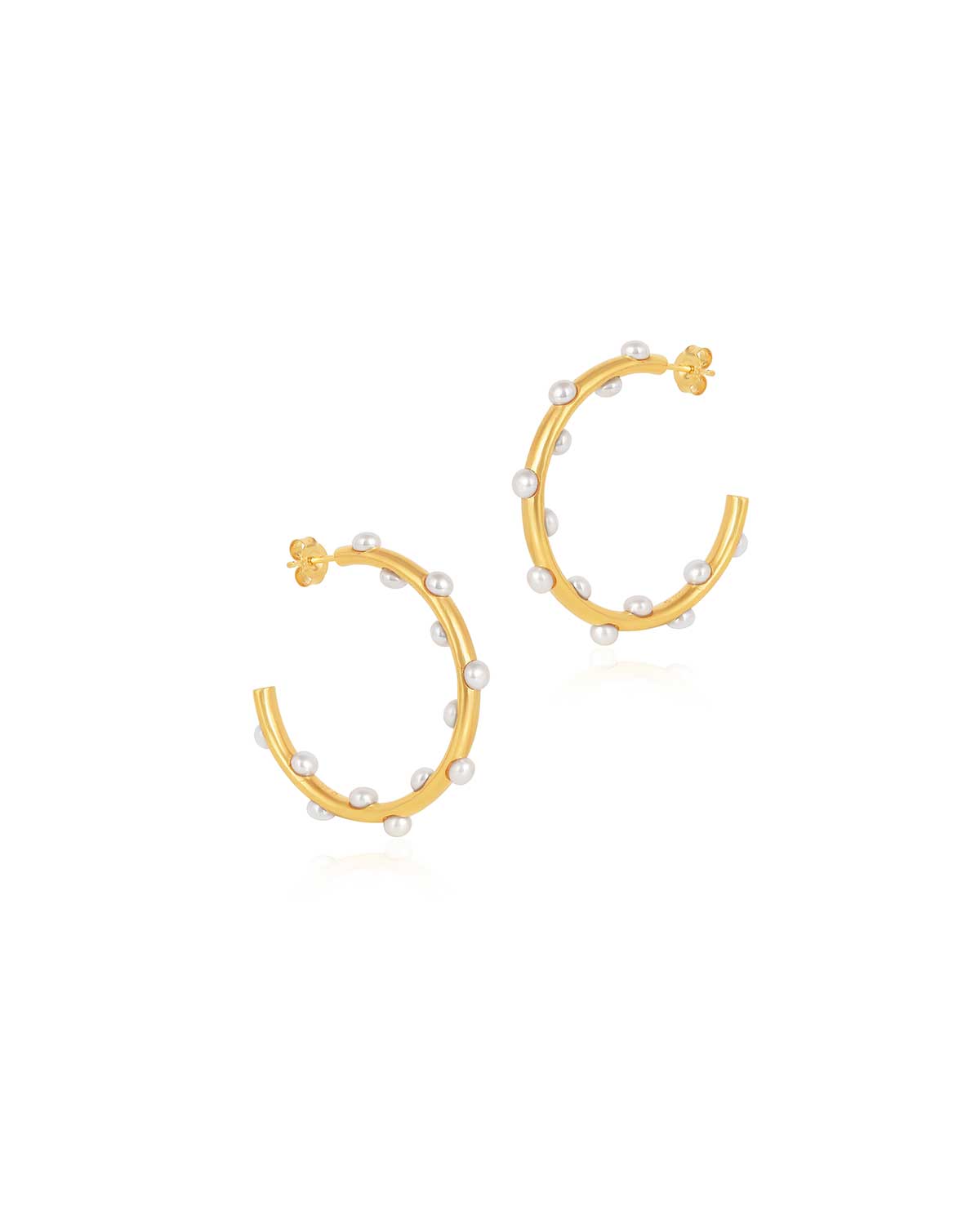 Statement gold hoop earrings adorned with multiple natural pearls, handcrafted finish