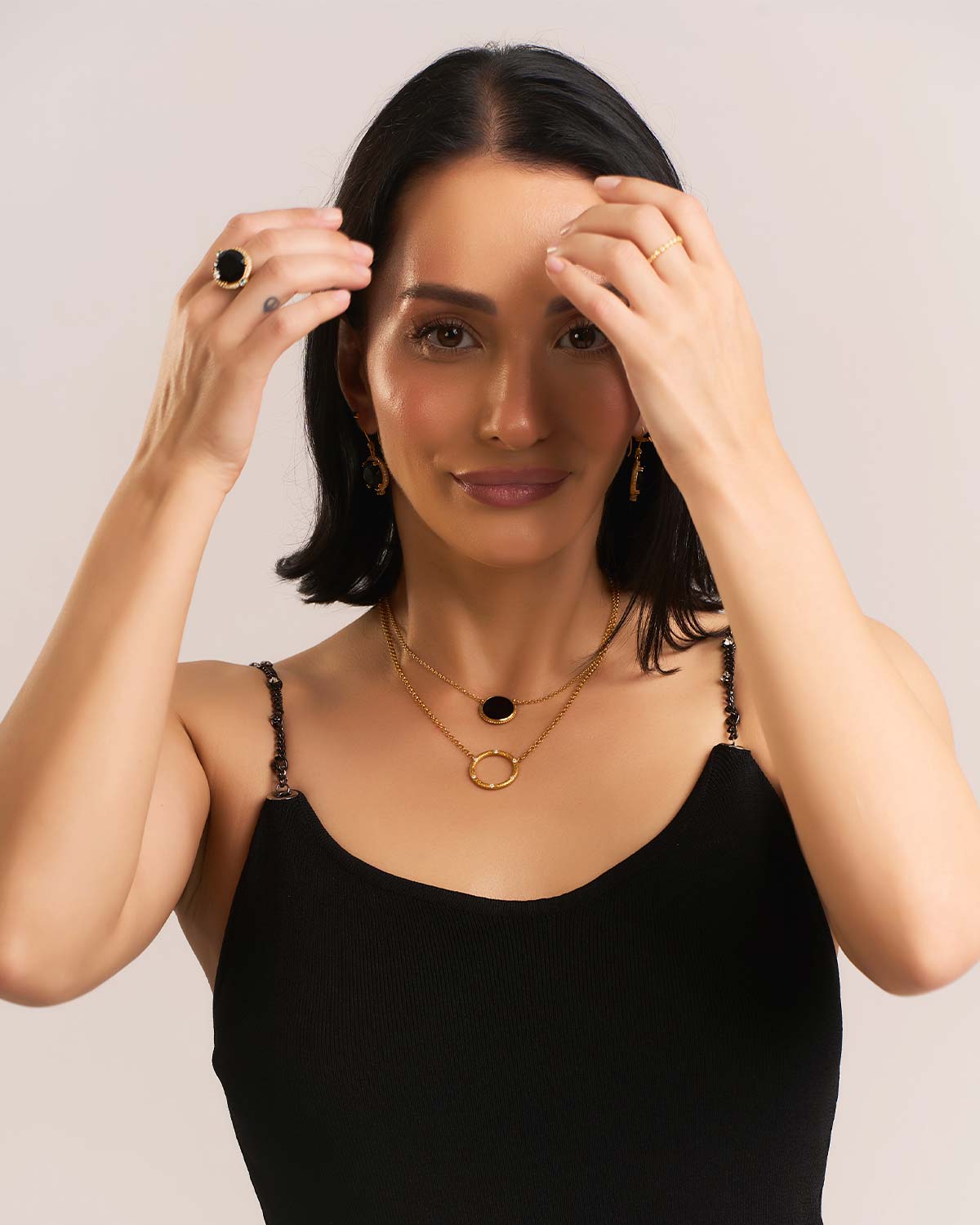 Gold necklace with 14mm black spinel pendant and polished finish