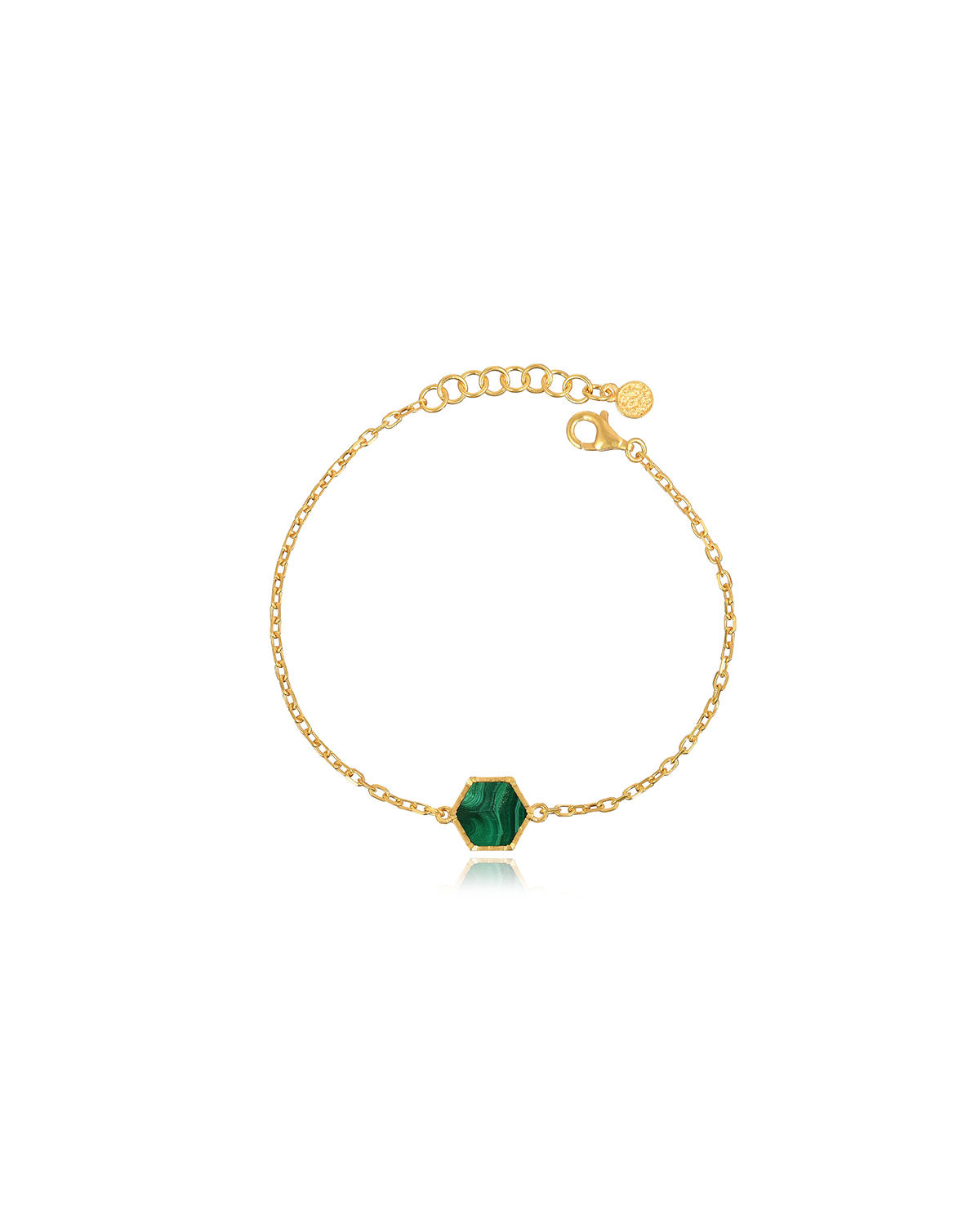 Gold and silver bracelet with a natural malachite gemstone and polished finish