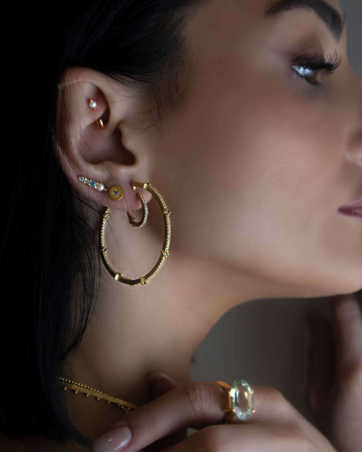 Dazzling Blue Spinal Gold Hoops - Moon London