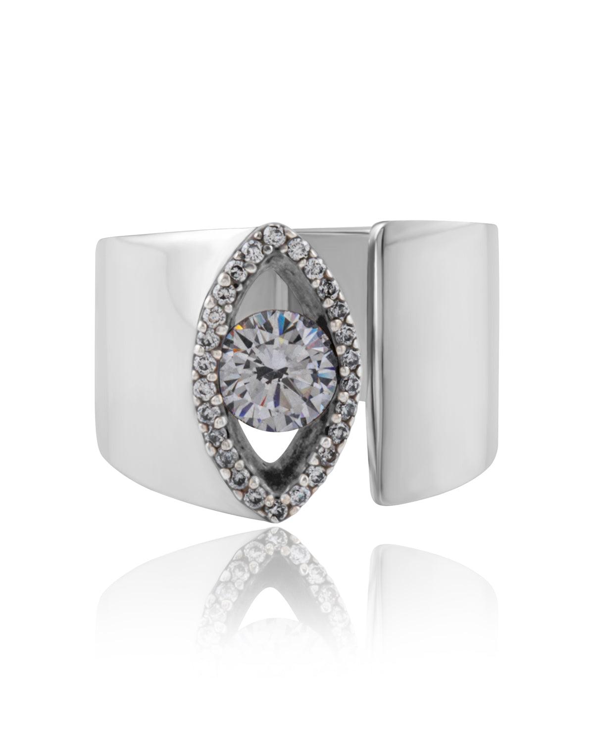 Front view of silver ring featuring a symbolic eye design