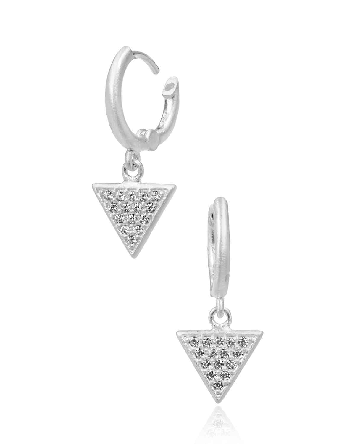 Close-up of mini hoop earrings with triangle charms and crystal detailing