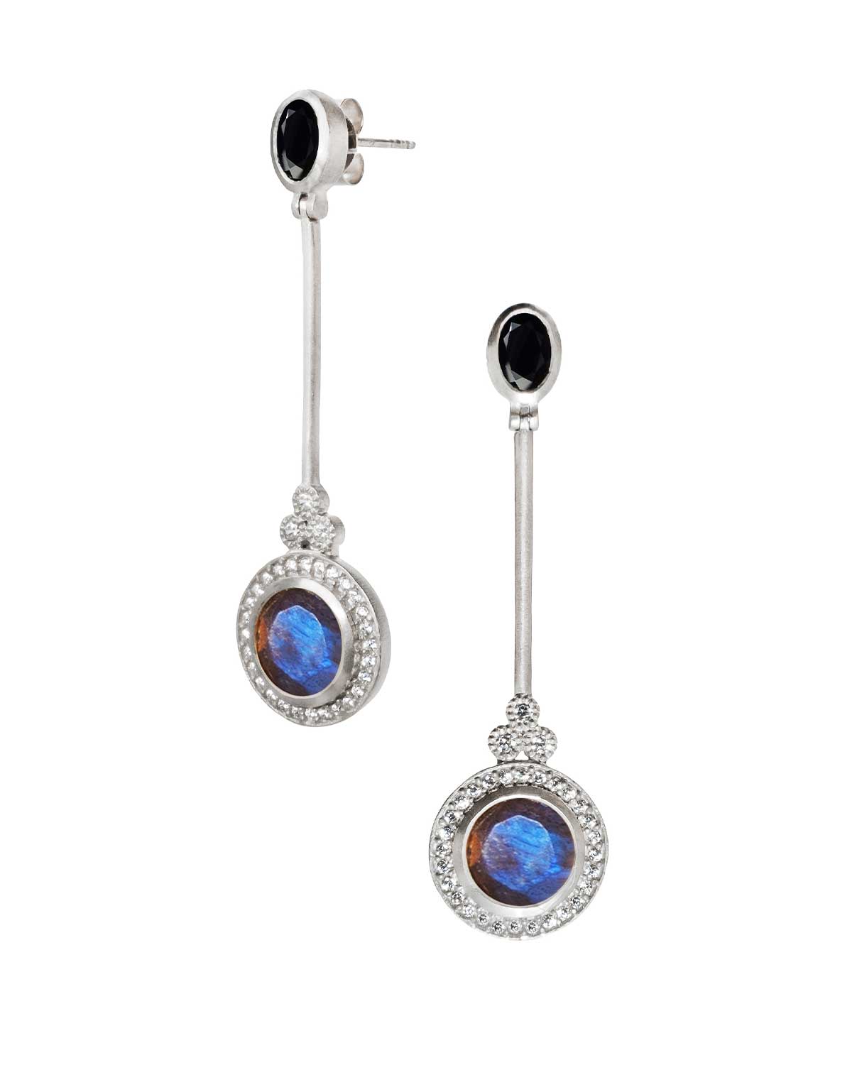 Silver earrings with faceted labradorite gemstones and a flowing design