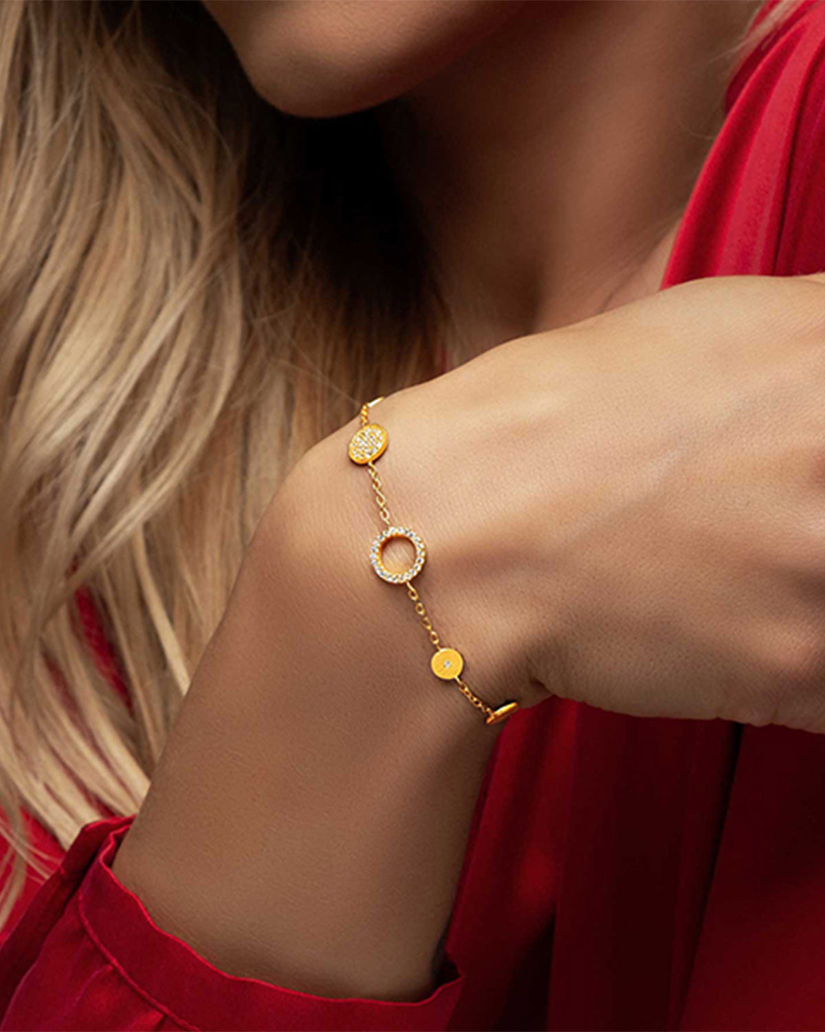 Gold vermeil bracelet worn on wrist with delicate crystal shine